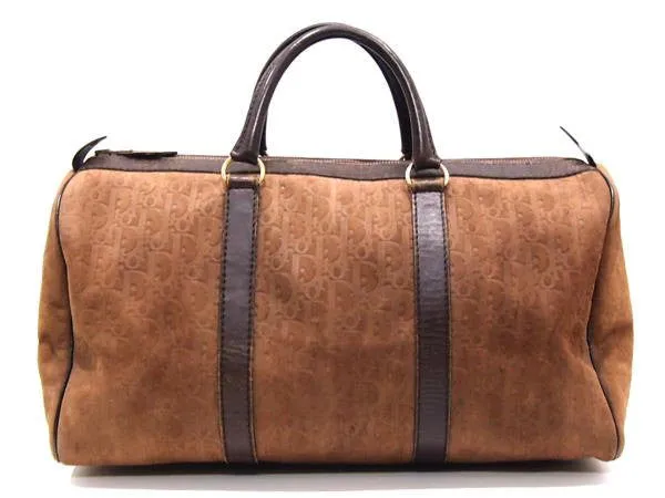 80's vintage Christian Dior Bagages genuine brown suede leather travel duffle bag, purse with embossed Dior logo allover. Unisex luggage
